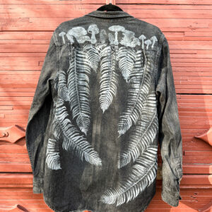 woodland button down against red wall