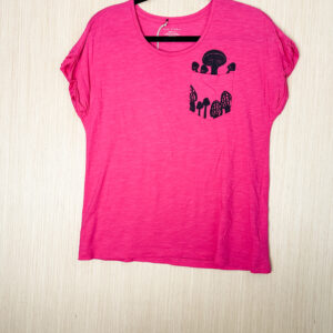Front of hot pink pocket tee printed with mushrooms in black ink growing out of the pocket.