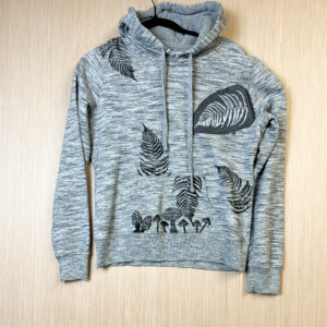 Front of heathered grey hoodie with fern and fungi pocket print.