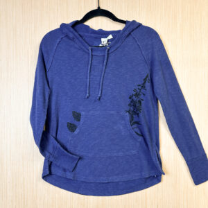 Front of dark blue hoodie with morels and fireweed printed in black ink growing out of pocket.