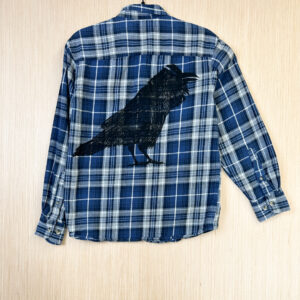 Back of flannel shirt with raven print.