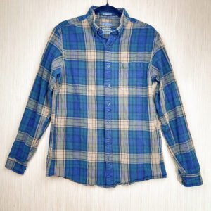Front of green, blue, and gold plaid flannel button down.