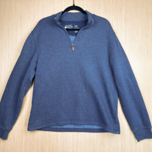 Front of heathered blue quarter zip sweatshirt.